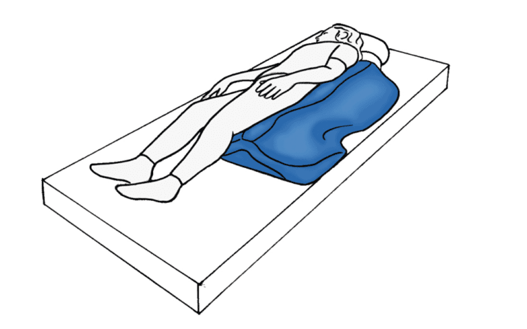 Cunha de posicionamento semi-lateral na cama